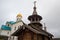 SAINT-PETERSBURG, RUSSIA: Wooden chapel with a bell tower and carved porch at the church of the Holy St. Seraphim Vyritsky