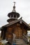 SAINT-PETERSBURG, RUSSIA: Wooden chapel with a bell tower and carved porch at the church of the Holy St. Seraphim Vyritsky