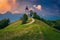 Saint Primoz mountain church at sunset, near Jamnik, Slovenia