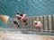 SAINT-QUAY PORTRIEUX-FRANCE,06 AUGUST 2014 Teens going for a swim in the port of Saint-Quay Portrieux  in Brittany