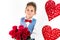 Saint Valentine`s day. Handsome gentleman boy with blue vest, red tie, red roses bucket and red balloons . Valentines day kids. L