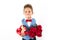 Saint Valentine`s day. Handsome gentleman boy with blue vest, red tie, red roses bucket and red balloons . Valentines day kids. L