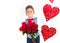 Saint Valentine`s day. Handsome gentleman boy with blue vest, red tie, red roses bucket and red balloons . Valentines day kids. L