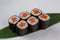 Sake maki Japanese sushi rolls with salmon on white background