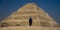 Sakkara Pyramid known as Step Pyramid first pyramid of Egypt shows man admiring structure
