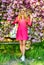 Sakura season. Gorgeous girl. Spring fashion collection. Woman spring flower sakura bloom background. Blonde woman in