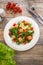 Salad of arugula with cherry tomatoes and croutons