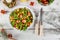 Salad with arugula, strawberries and pineapple with christmas decoration