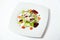 Salad with bacon, parmesan and cherry sauce