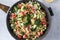 Salad with bulgur, tomatoes, cucumbers and parsley. Tabouleh dish. Oriental cuisine.
