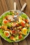 Salad Caesar with mushrooms, eggs, chili and radish