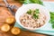 Salad from canned saury and chicken eggs and empty tartlets