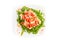 Salad with chicken meat, tomato and rucola isolated on white