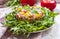 Salad of chicken tenderloins with avocado, tomatoes, sweet pepp