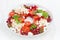 Salad with cottage cheese, tomatoes, mint pesto and pomegranate