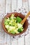 Salad in a deep bowl, broccoli, pepper and apple