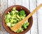 Salad in a deep bowl, broccoli, pepper and apple