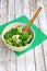 Salad in a deep bowl, broccoli, pepper and apple