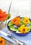 Salad with edible flowers nasturtium, borage.