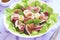 Salad with figs, mozzarella, prosciutto and raspberries