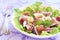 Salad with figs, mozzarella, prosciutto and raspberries