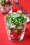 Salad with fresh radishes in a glass