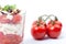 Salad in glass with tomatoes, feta cheese and fresh basil