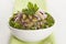 Salad with herring, red onion, white bean and pickled cucumber
