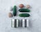 Salad ingredients and two iron cans on a white background