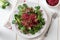 Salad with lamb`s lettuce and fresh red beet sprouts