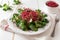 Salad with lamb`s lettuce and fresh red beet sprouts