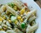 Salad with pasta, sardines .
