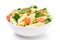 Salad with pasta, smoked salmon, broccoli, green peas on white