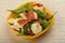 Salad with proscuitto, mozzarella