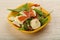 Salad with proscuitto, mozzarella