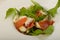 Salad with proscuitto, mozzarella