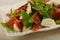 Salad with proscuitto, mozzarella