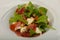 Salad with proscuitto, mozzarella