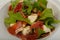 Salad with proscuitto, mozzarella