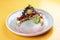 Salad with quinoa, fresh tuna, crispy cream yolk and white cream cheese mousse