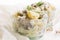 Salad rasols made of herring, cucumber and potato, dressed with mayonnaise and mustard