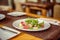 Salad of red fish Salmon, roll with Kamchatsky crab, arugula, avocado, sesame and oil