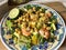 Salad with tiger prawns, mango, avocado and sweet chili.