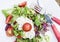 Salad with tomatoes and sour cream