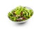 Salad on White. A bowl of fresh lettuce green salad over white with shadow