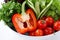 Salad on a white restaurant table, closeup