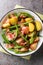 Salade Liegeoise Belgian Potato Salad is a warm potato salad with green beans, bacon and a mustard vinaigrette closeup on the