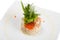 Salade Olivier decorated with shrimps and red caviar