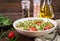 Salads with quinoa, arugula, radish, tomatoes and cucumber