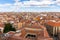 Salamanca city skyline with Casa de las Conchas courtyard, medieval Spanish architecture.
